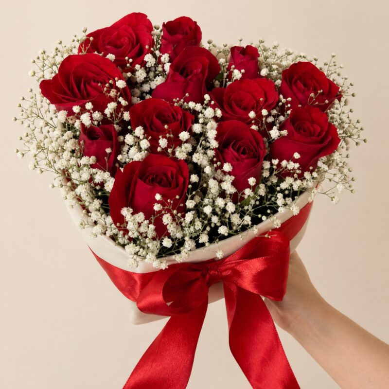 Caja peluchito con 12 rosas y baby breath